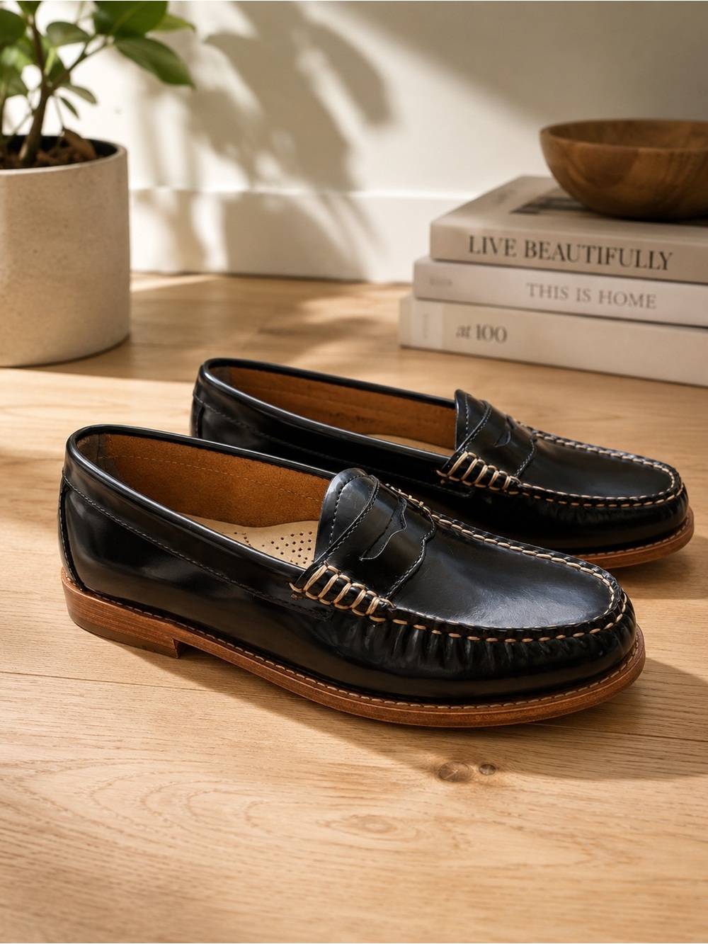 G.H. Bass & Co. Black Leather Penny Loafers with Brown Sole